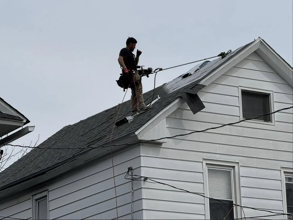 Slide of Al Benjamin Roofing