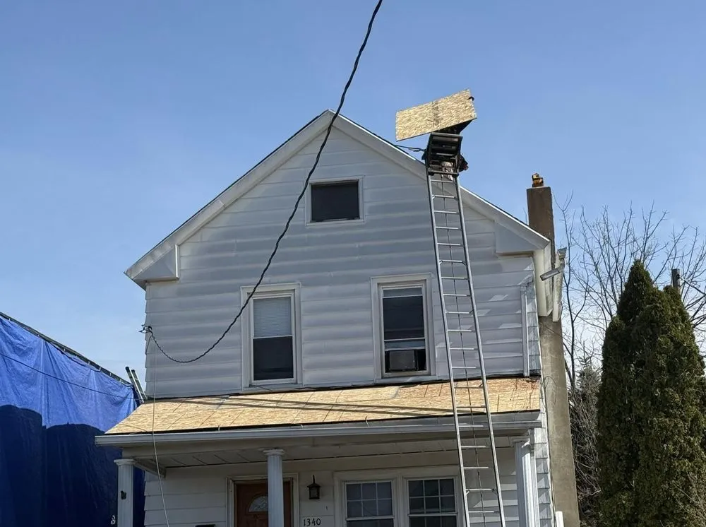 Slide of Al Benjamin Roofing