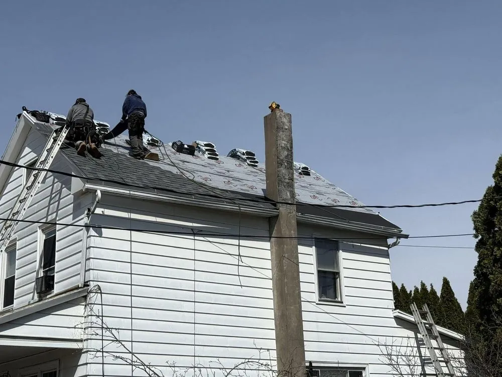 Slide of Al Benjamin Roofing