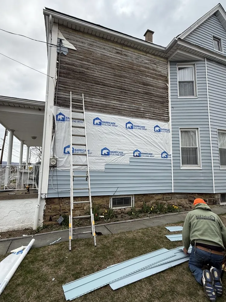 Slide of Al Benjamin Roofing