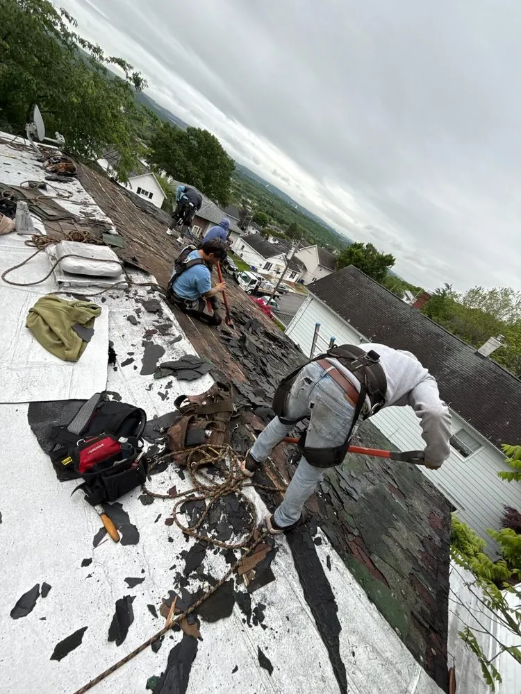 Slide of Al Benjamin Roofing