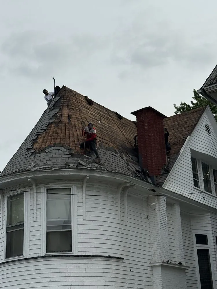 Slide of Al Benjamin Roofing