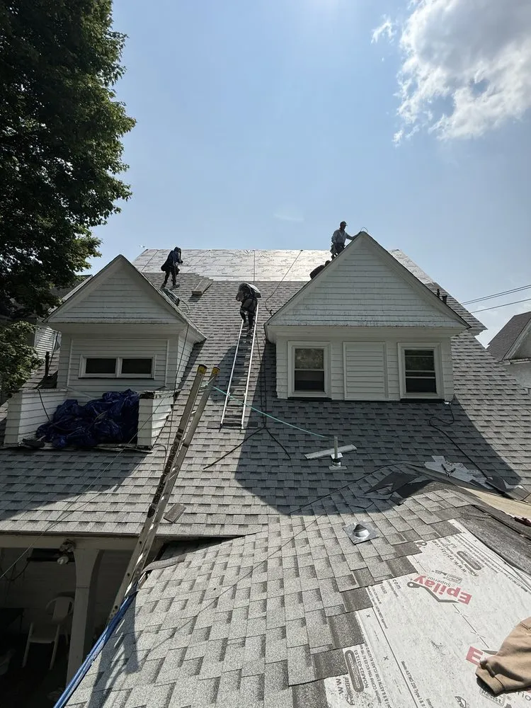 Slide of Al Benjamin Roofing