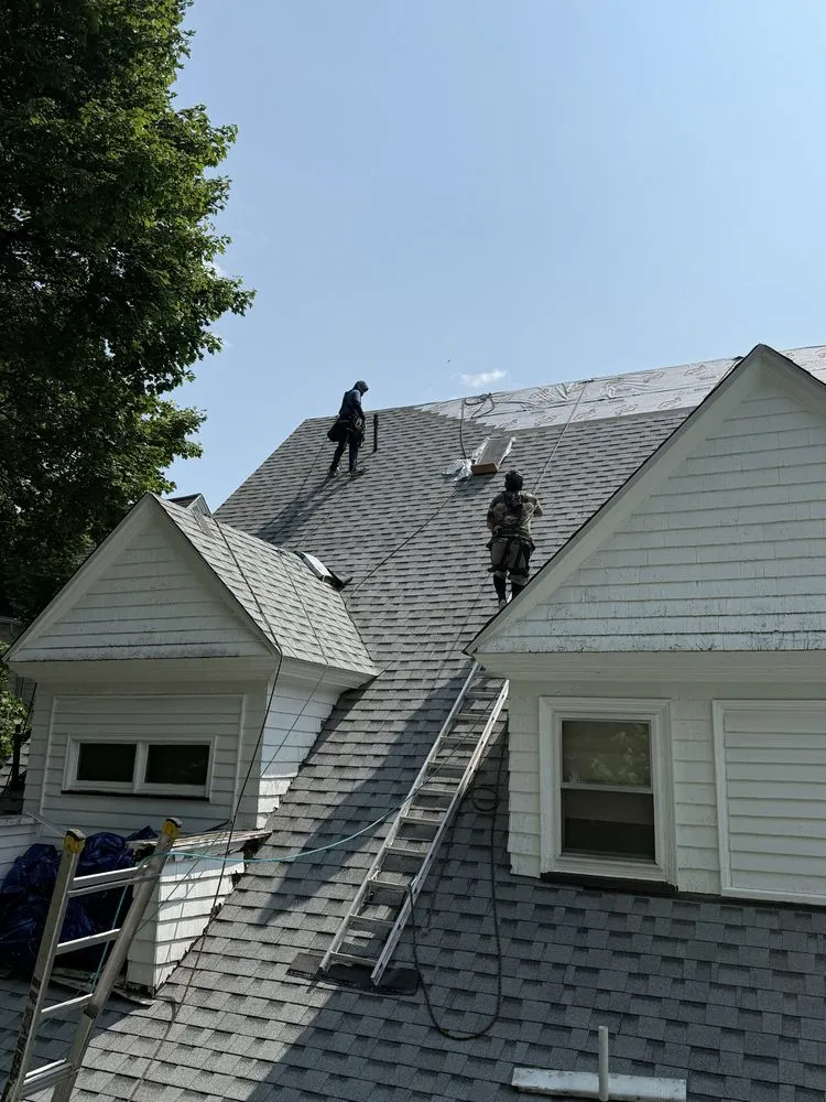 Slide of Al Benjamin Roofing