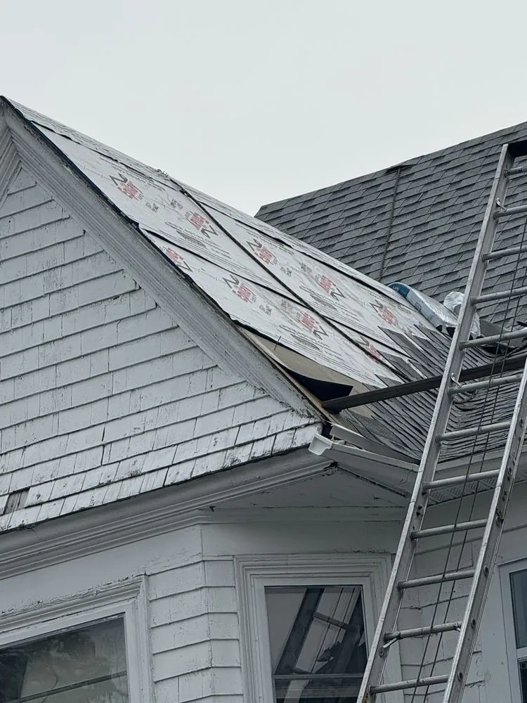 Slide of Al Benjamin Roofing