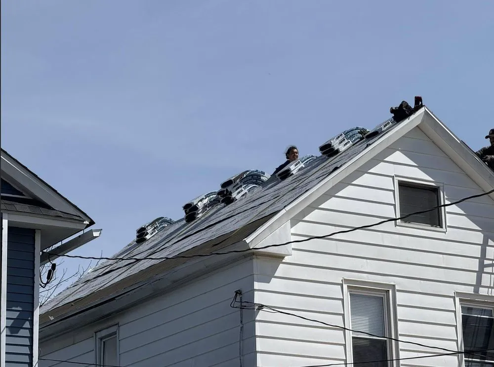 Slide of Al Benjamin Roofing