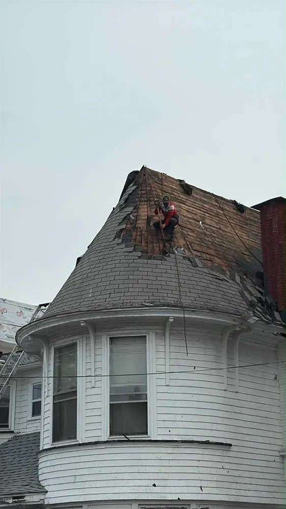 Slide of Al Benjamin Roofing