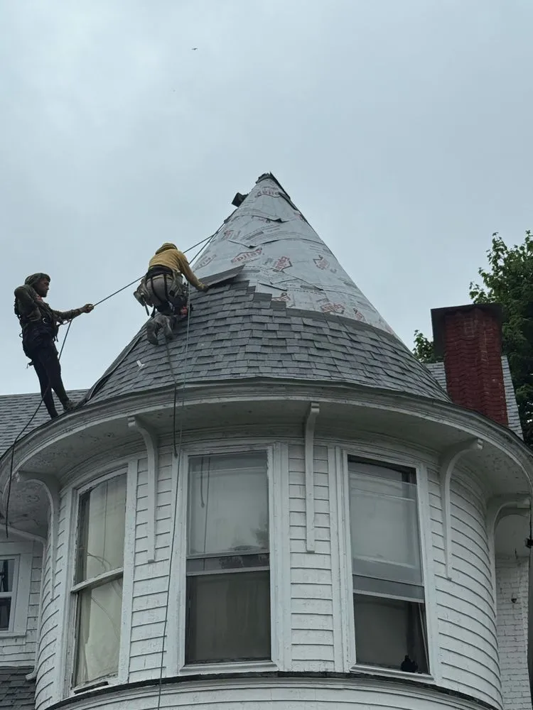 Slide of Al Benjamin Roofing