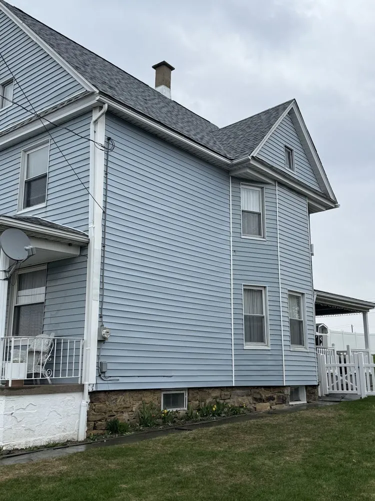 Slide of Al Benjamin Roofing