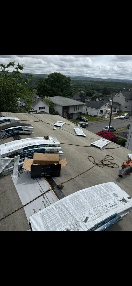 Slide of Al Benjamin Roofing