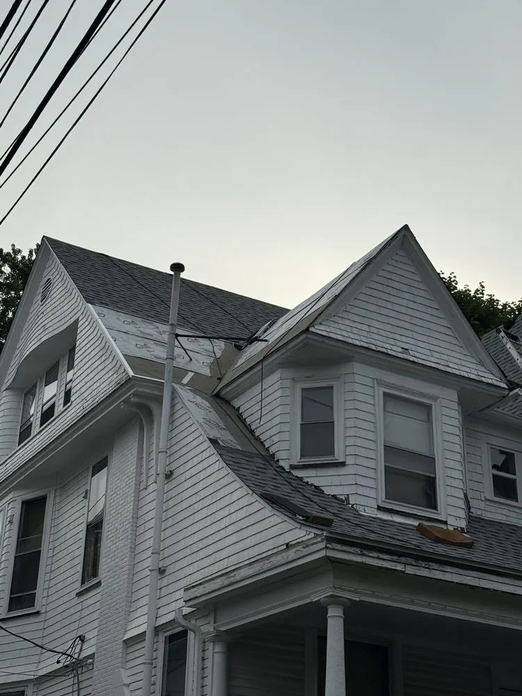 Slide of Al Benjamin Roofing