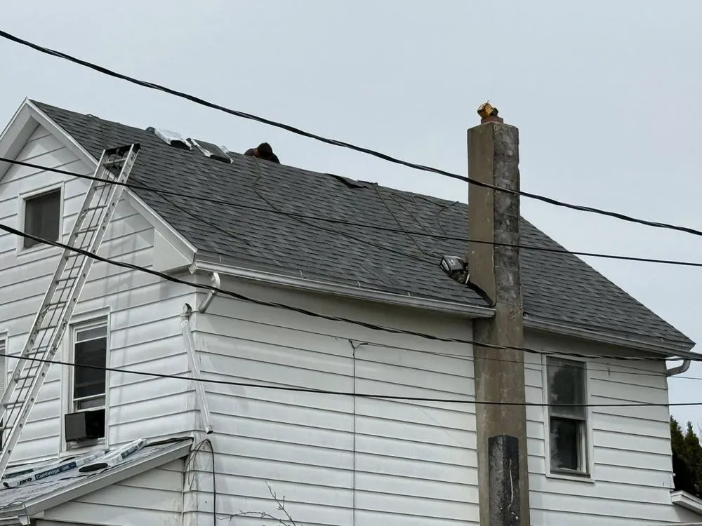 Slide of Al Benjamin Roofing