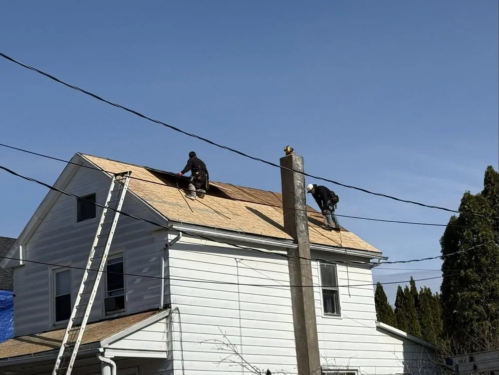 Slide of Al Benjamin Roofing