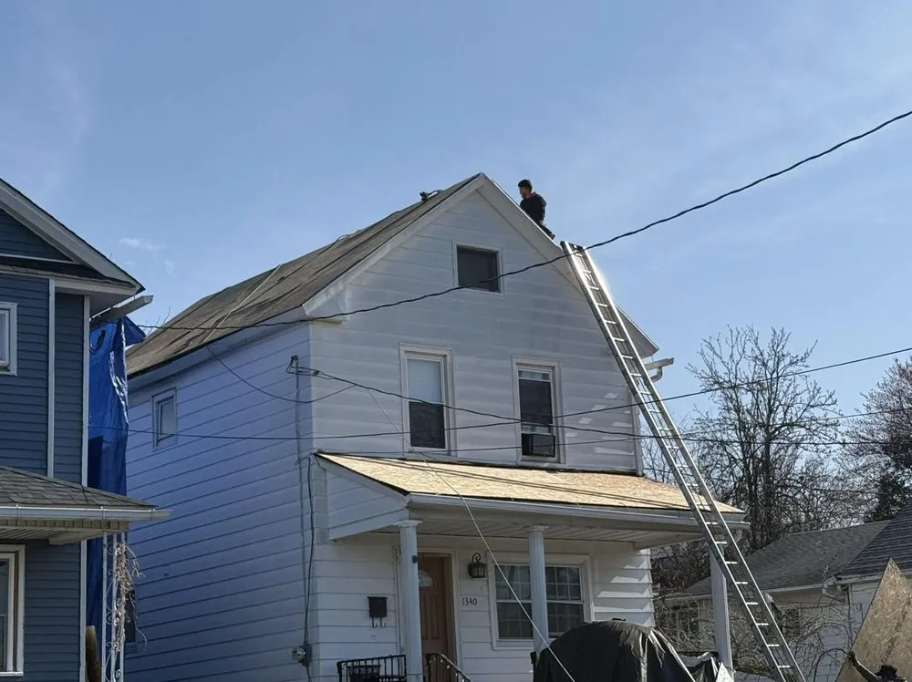 Slide of Al Benjamin Roofing