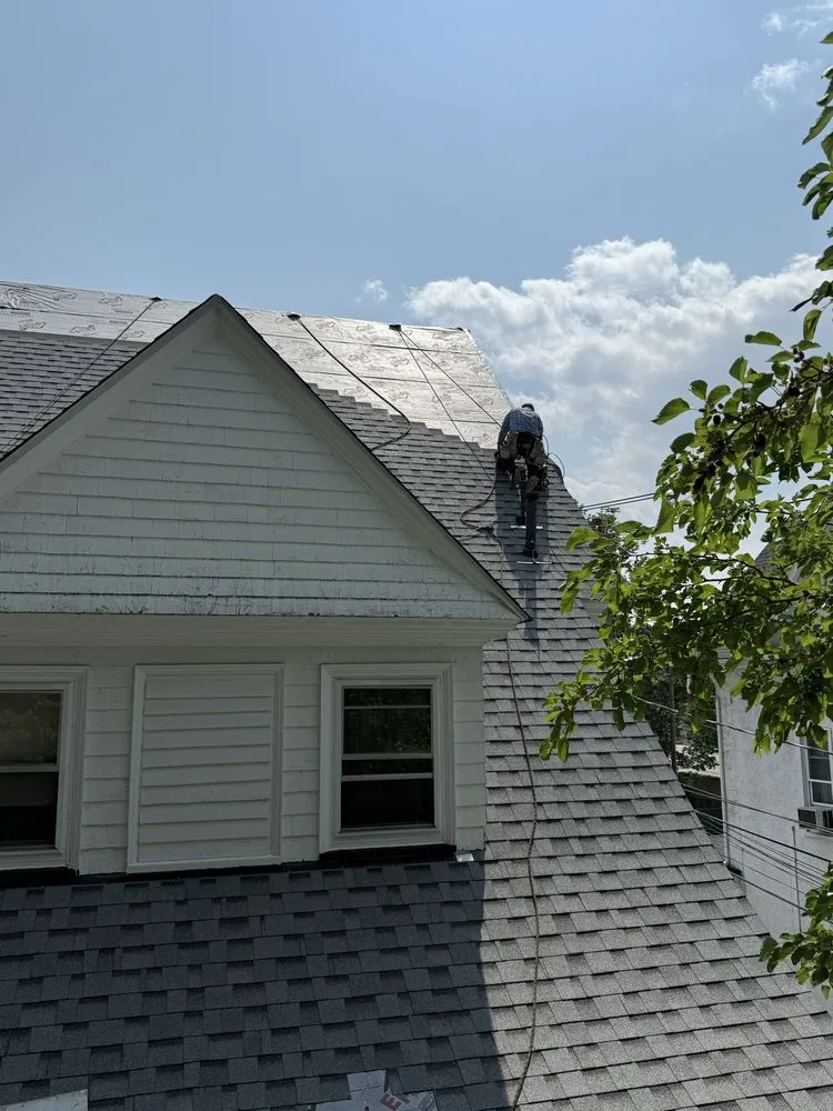 Slide of Al Benjamin Roofing