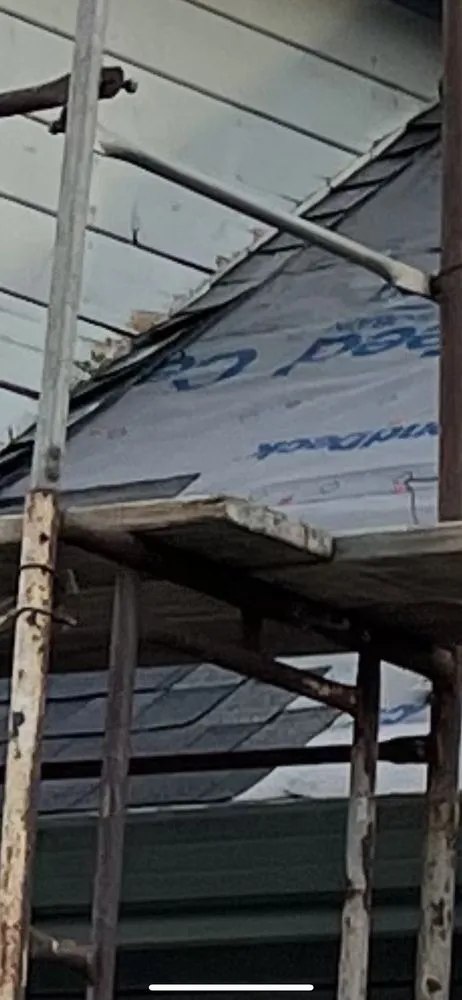 Slide of Al Jr's Roofing