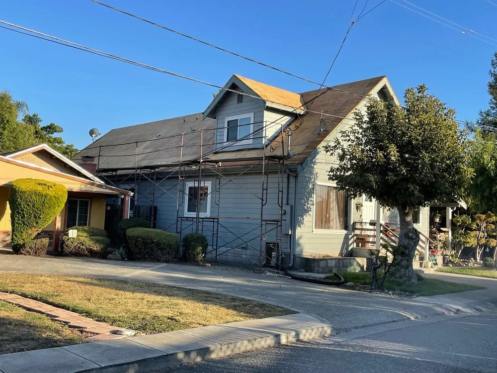 Slide of Al Jr's Roofing