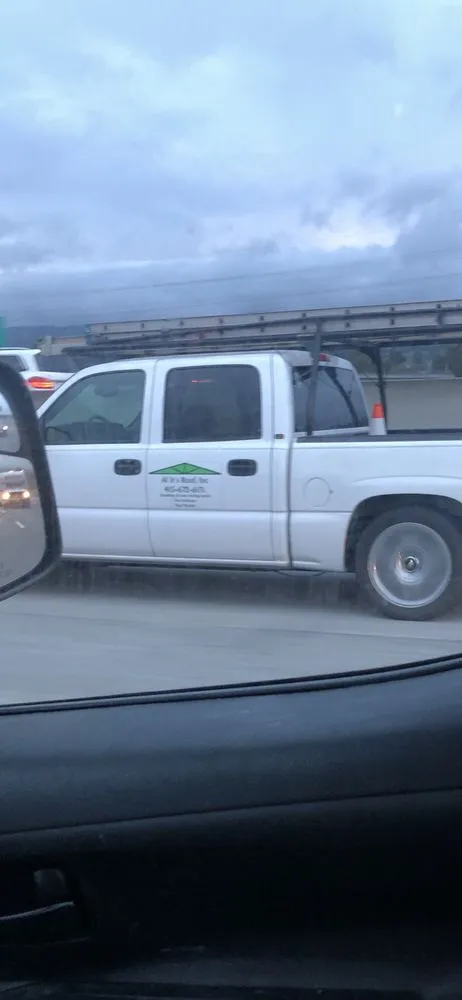 Slide of Al Jr's Roofing