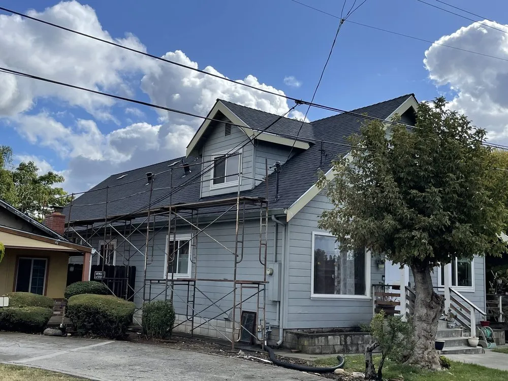 Slide of Al Jr's Roofing