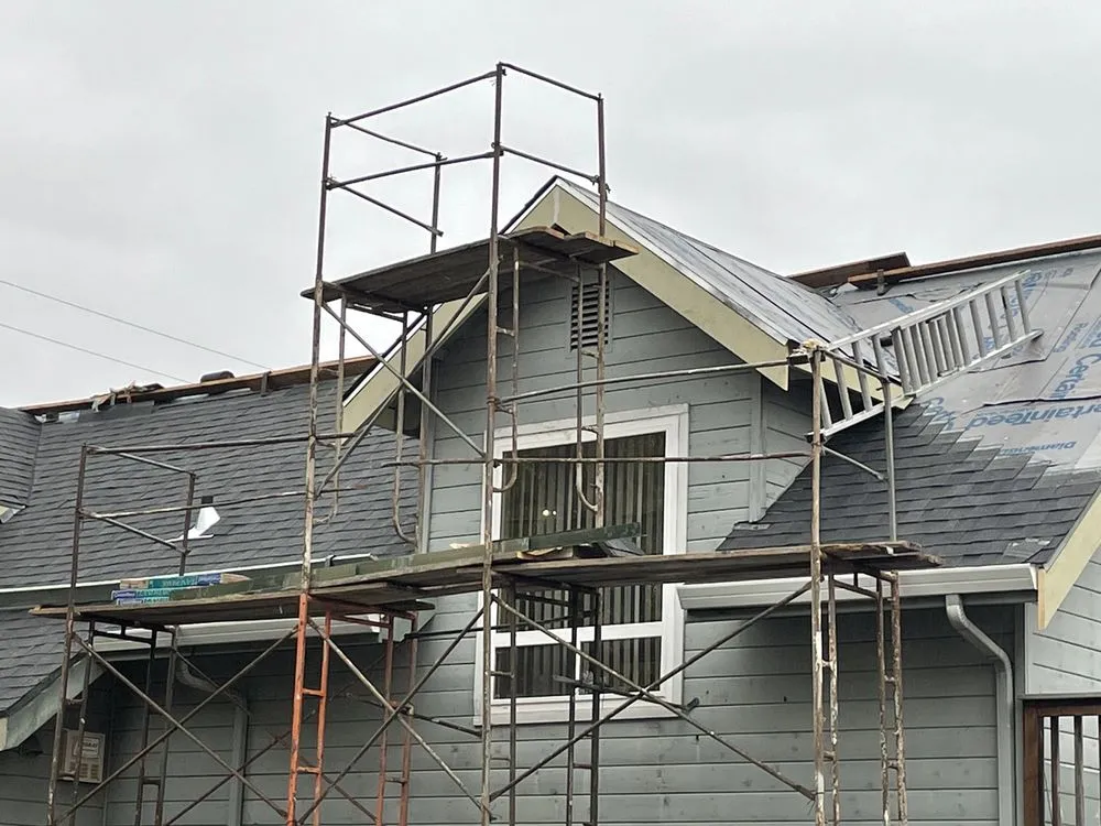 Slide of Al Jr's Roofing