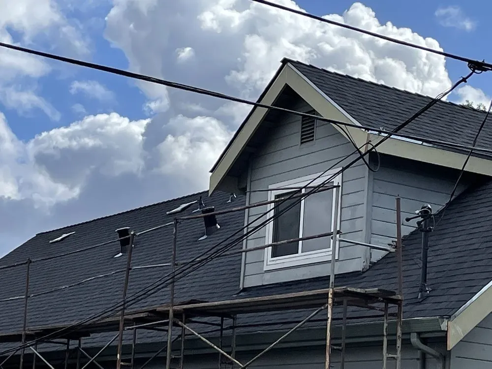 Slide of Al Jr's Roofing