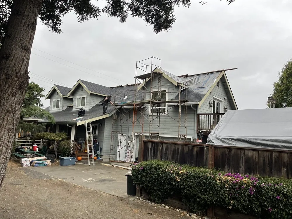 Slide of Al Jr's Roofing