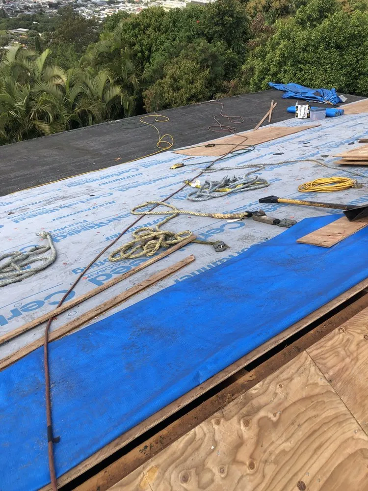 Slide of AL Roofing & RainGutters