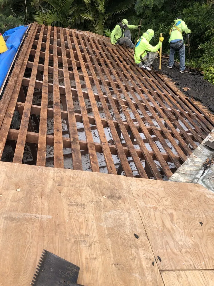 Slide of AL Roofing & RainGutters