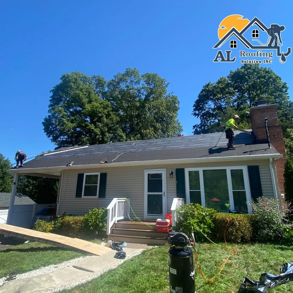 Slide of AL Roofing Solutions