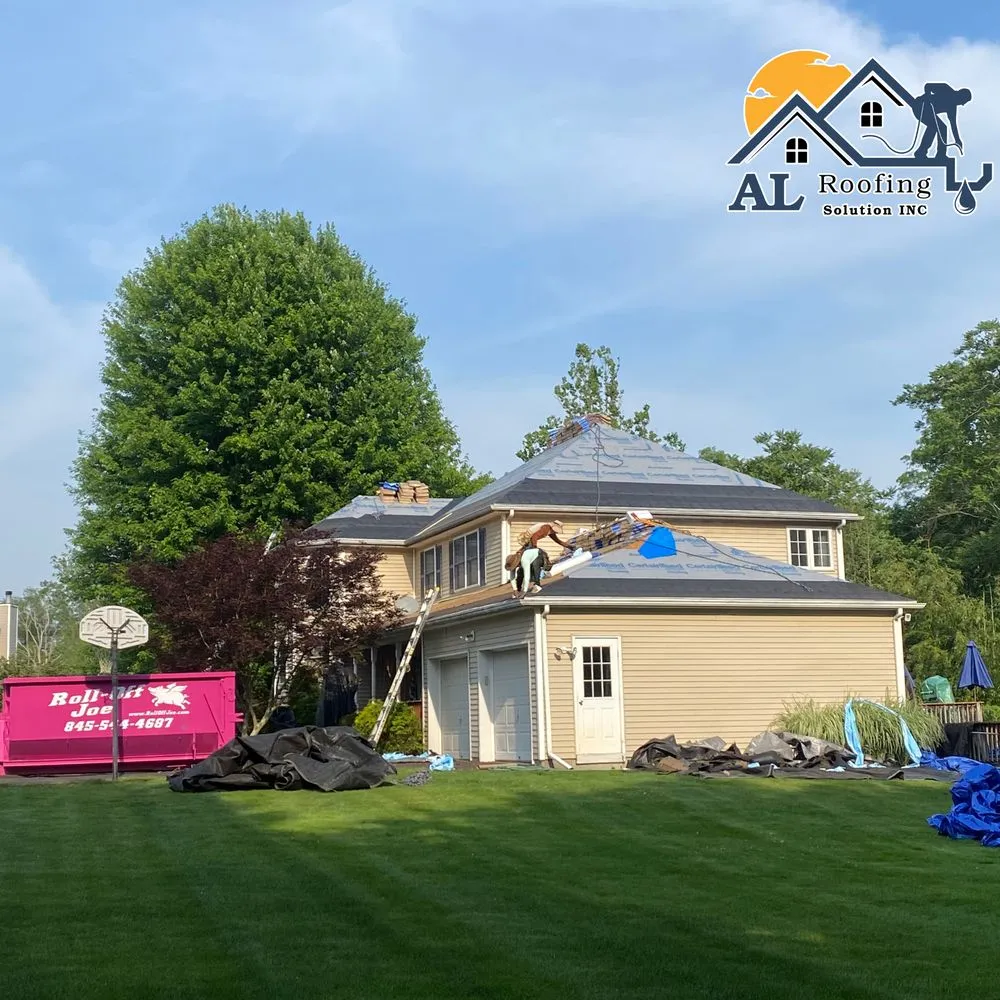 Slide of AL Roofing Solutions