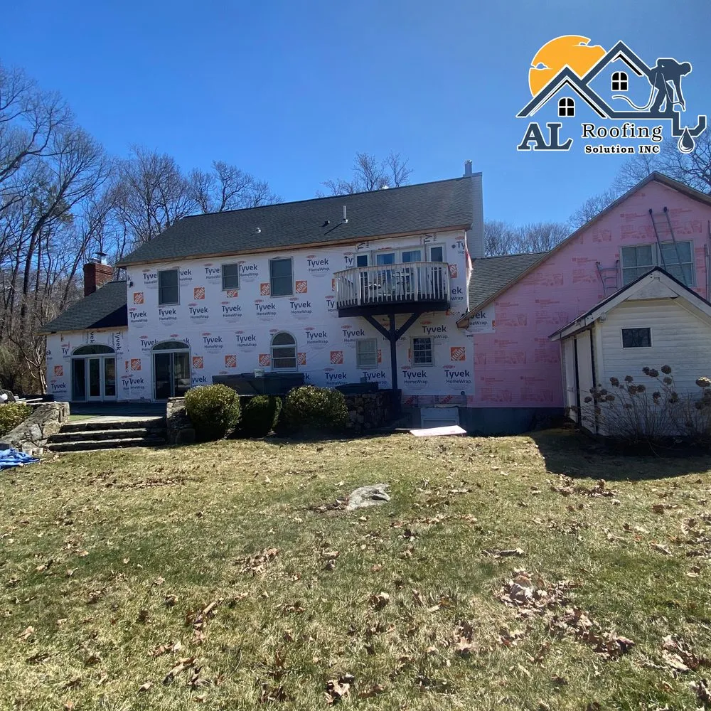 Slide of AL Roofing Solutions