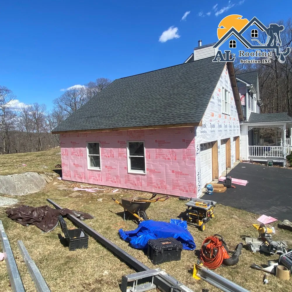 Slide of AL Roofing Solutions