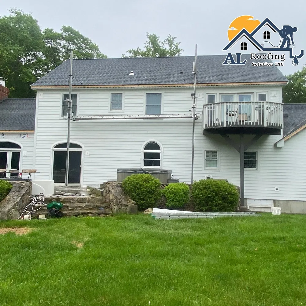 Slide of AL Roofing Solutions