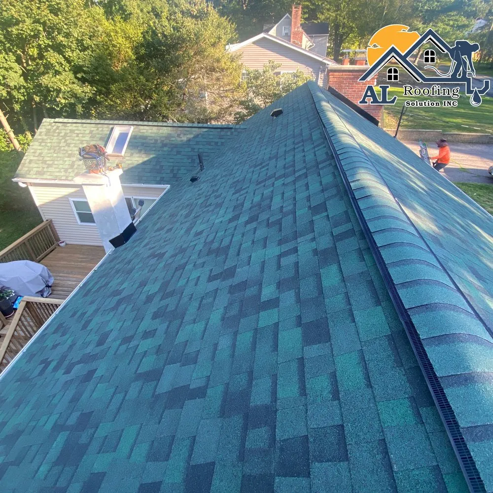 Slide of AL Roofing Solutions