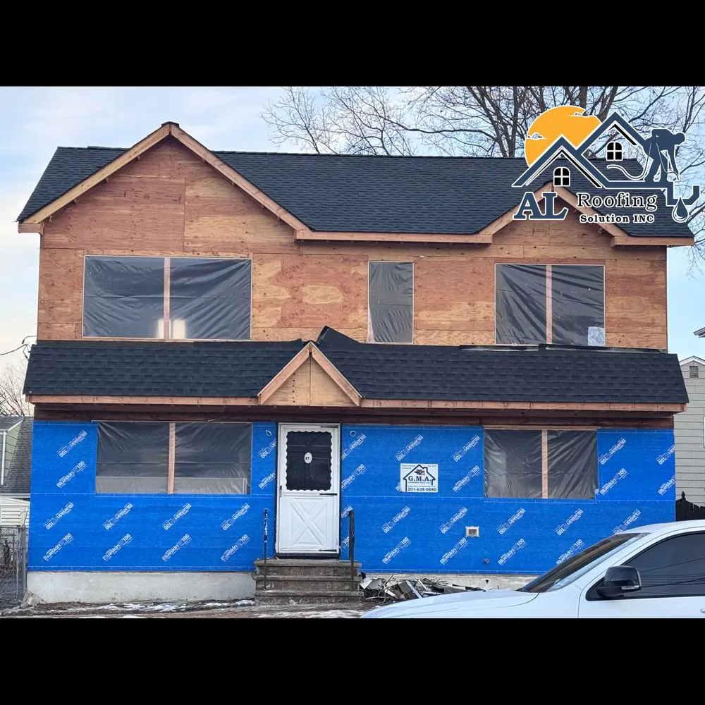 Slide of AL Roofing Solutions