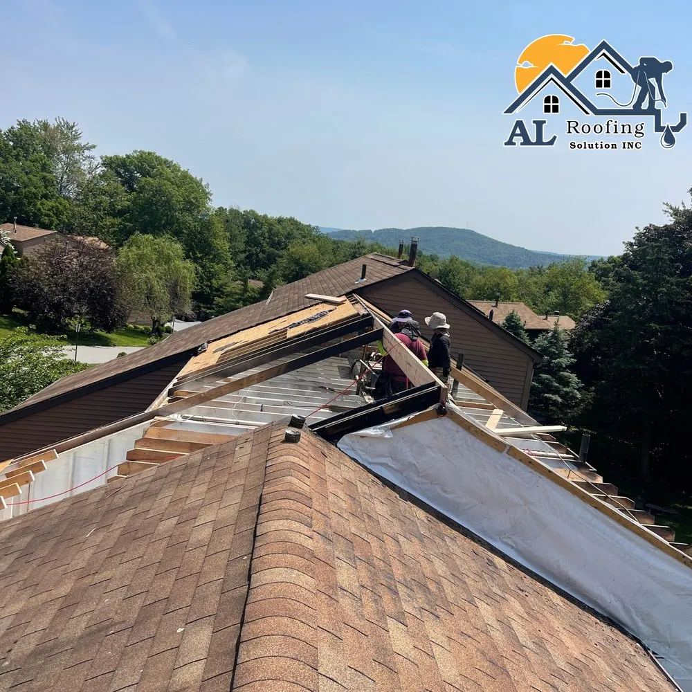 Slide of AL Roofing Solutions