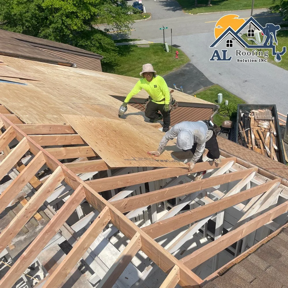 Slide of AL Roofing Solutions