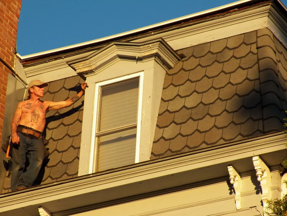 Slide of Al Smith Roofing