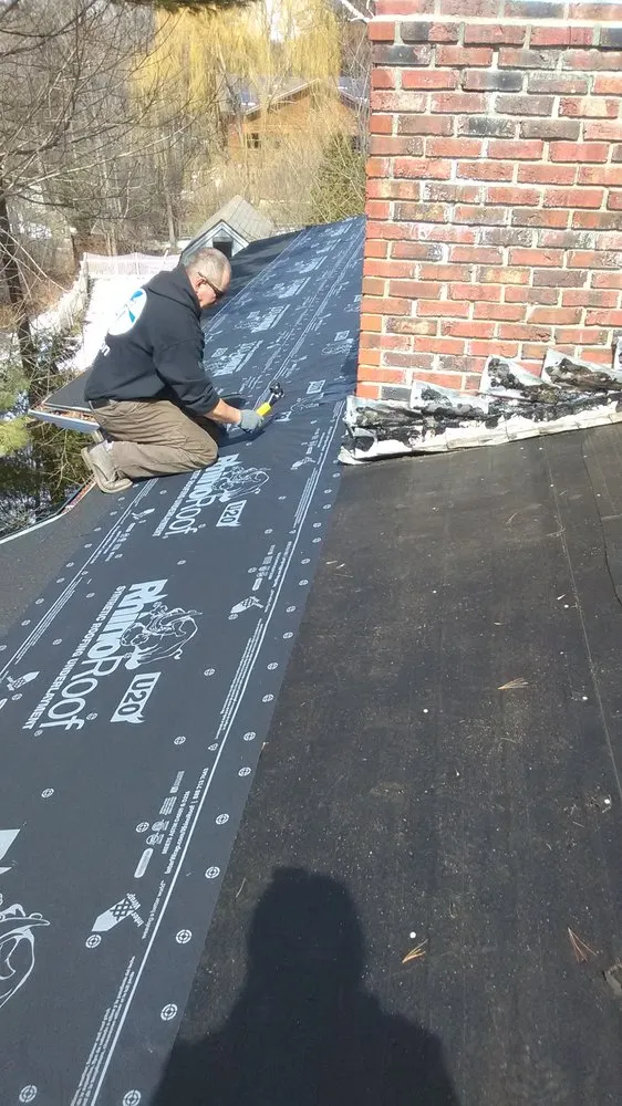 Slide of Al Smith Roofing