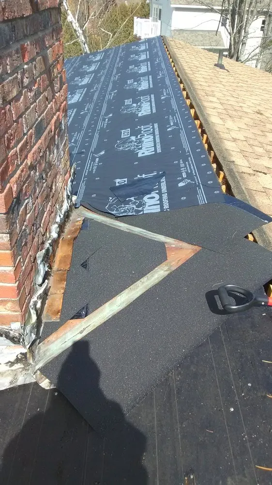 Slide of Al Smith Roofing