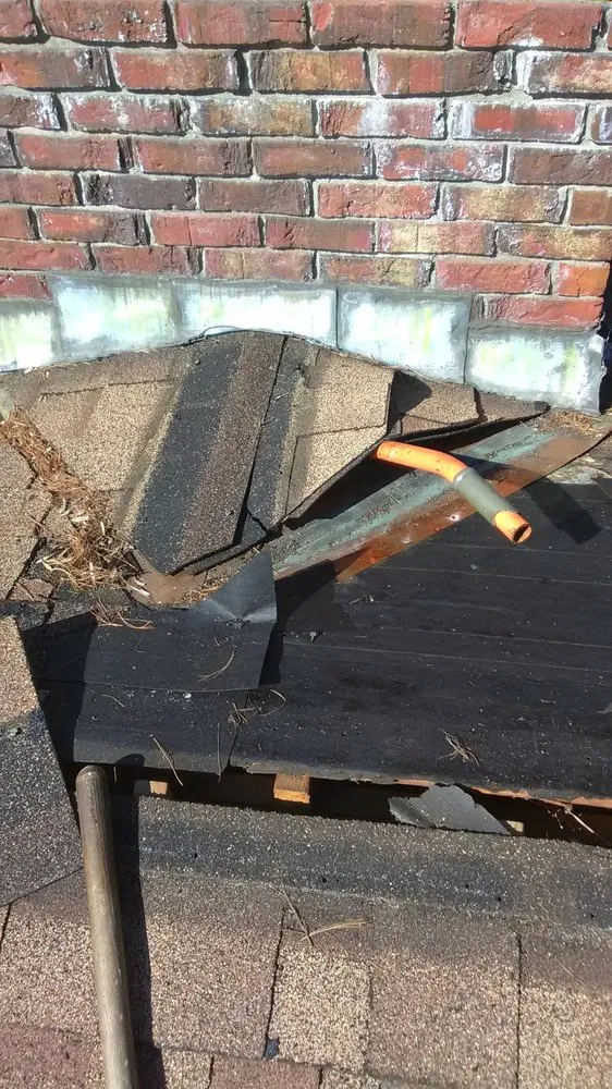 Slide of Al Smith Roofing