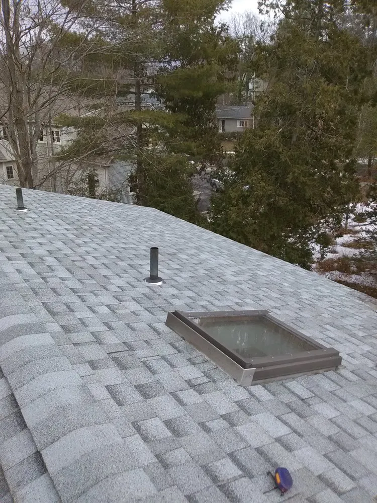 Slide of Al Smith Roofing