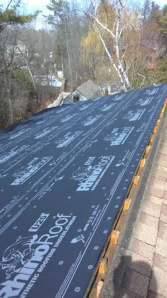 Slide of Al Smith Roofing