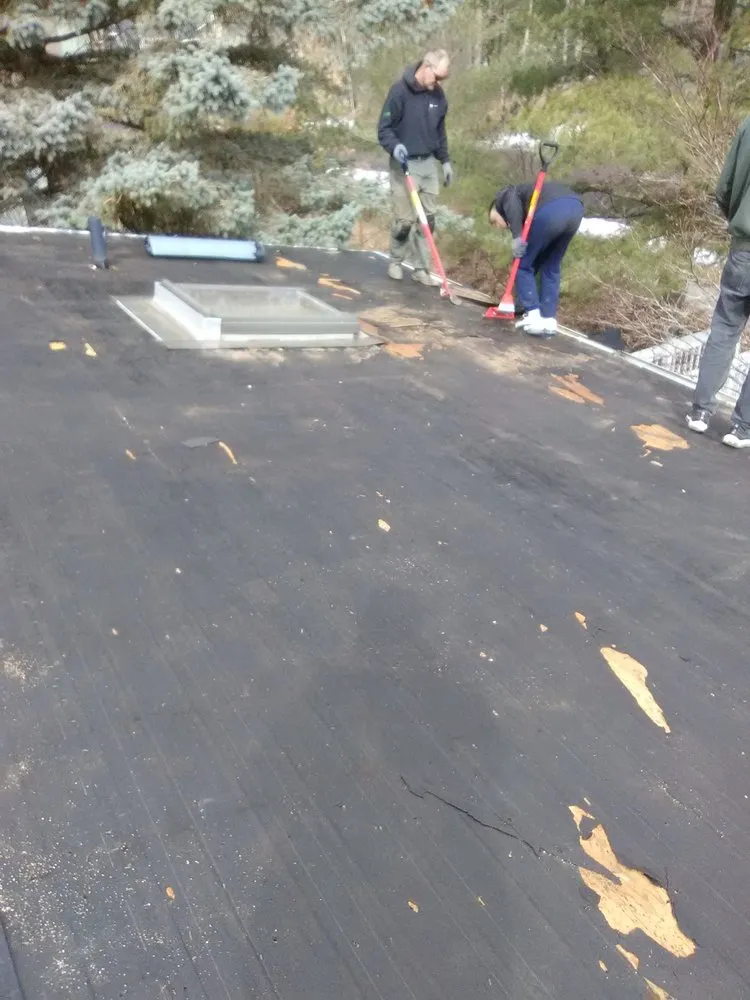 Slide of Al Smith Roofing