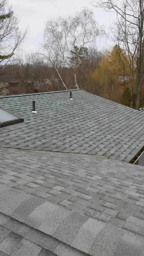 Slide of Al Smith Roofing