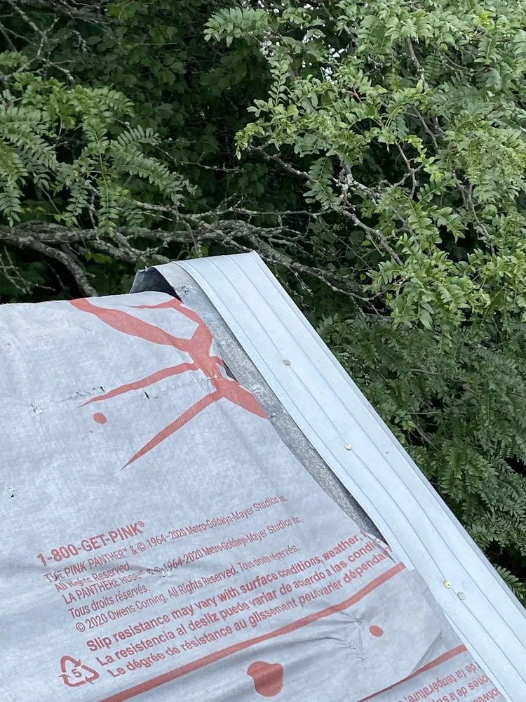 Slide of Al Smith Roofing