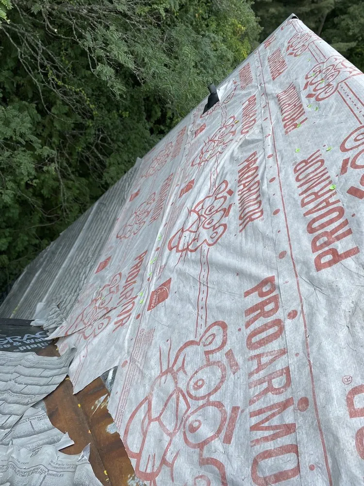 Slide of Al Smith Roofing