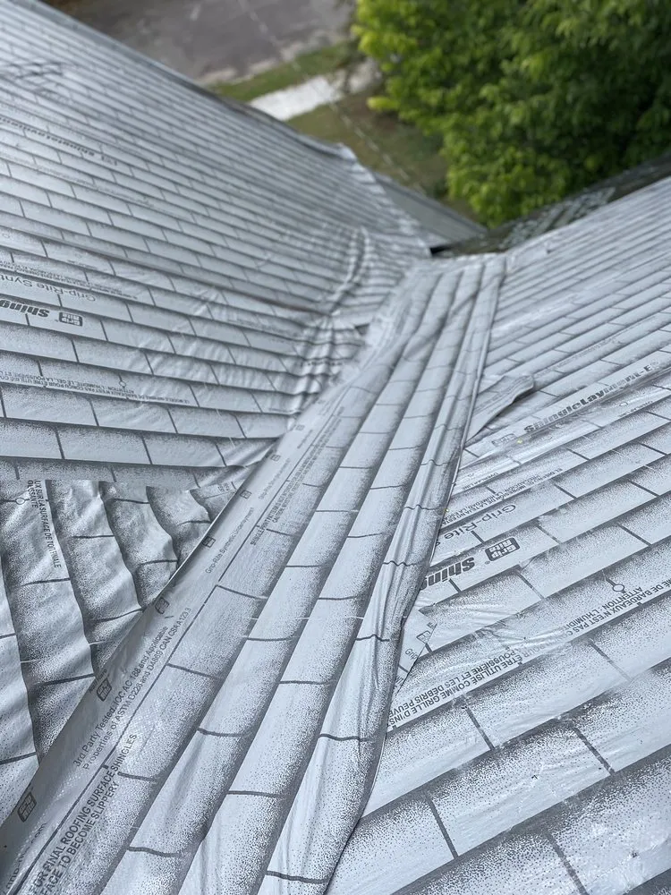 Slide of Al Smith Roofing