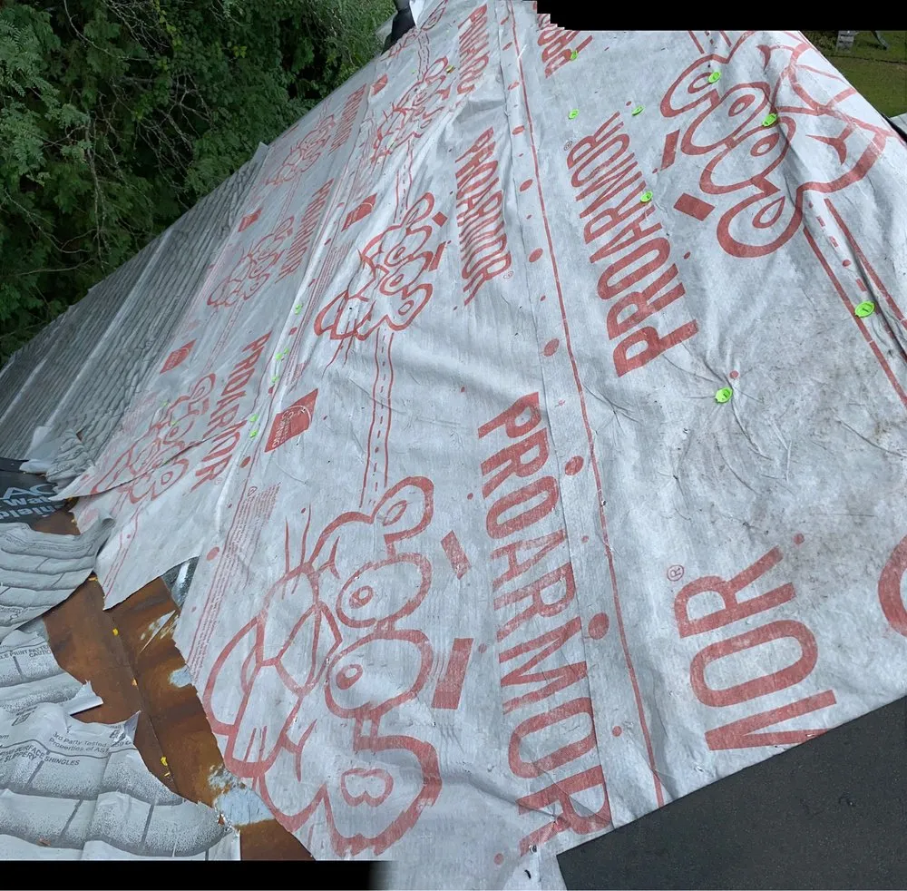 Slide of Al Smith Roofing