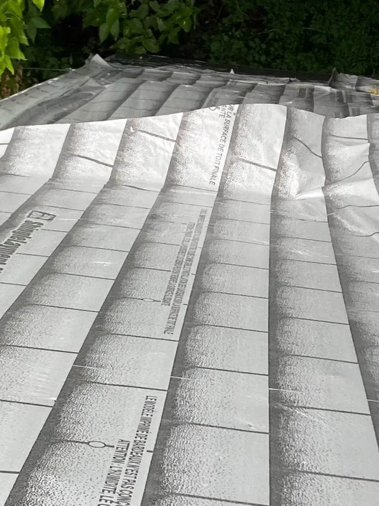 Slide of Al Smith Roofing